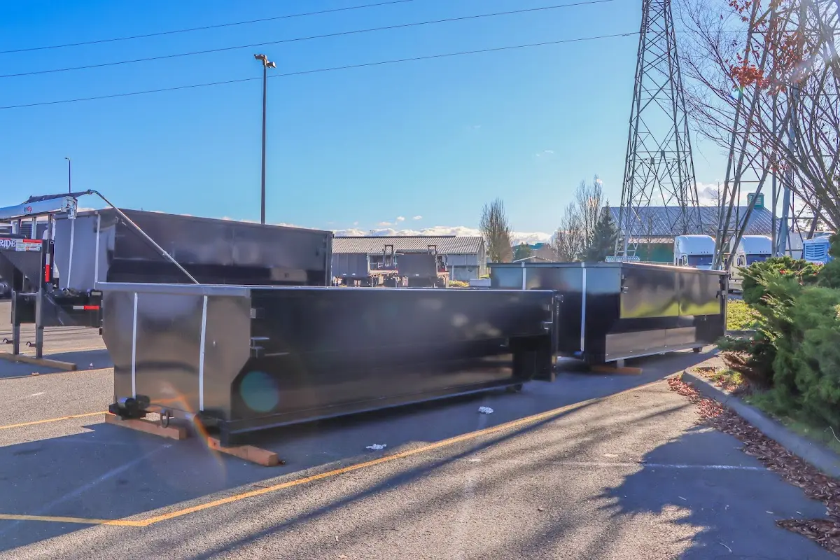 Roll-off dumpster ready for waste disposal at job site for 2 Yard Dumpster Rental in Mount Pleasant
